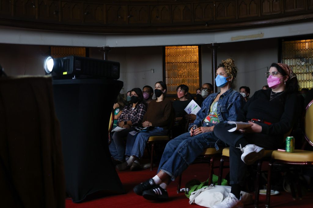 Camp guests attend and gaze upon the Friday night screening, co-presented with cinéSPEAK. (Photo: Luiza Barreto)